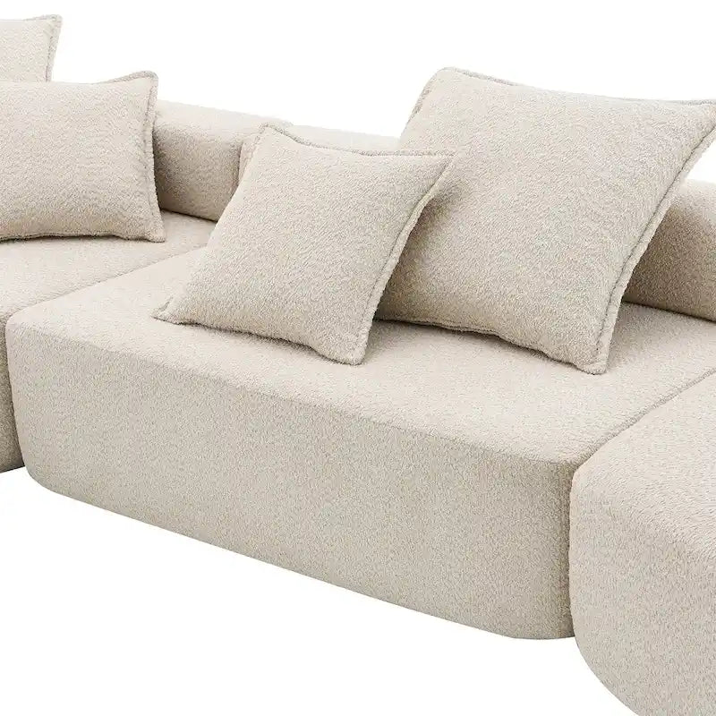 Canapé d'angle modulable rembourré en bouclé