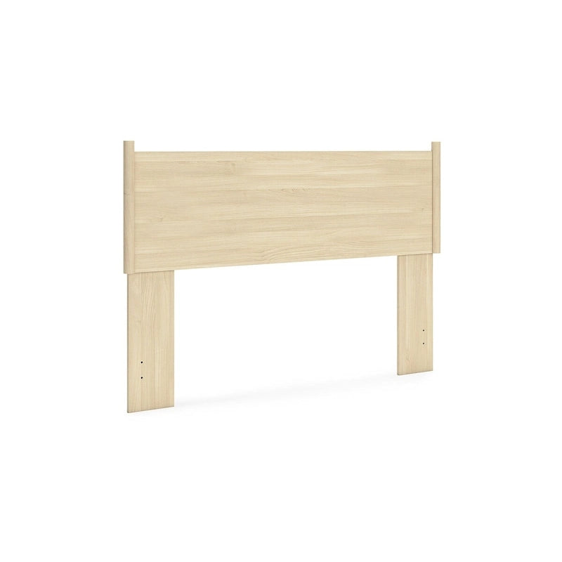 Tête de lit en panneaux marron avec coiffeuse et table de chevet